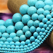Turkis perler. Blå. 14 mm streng